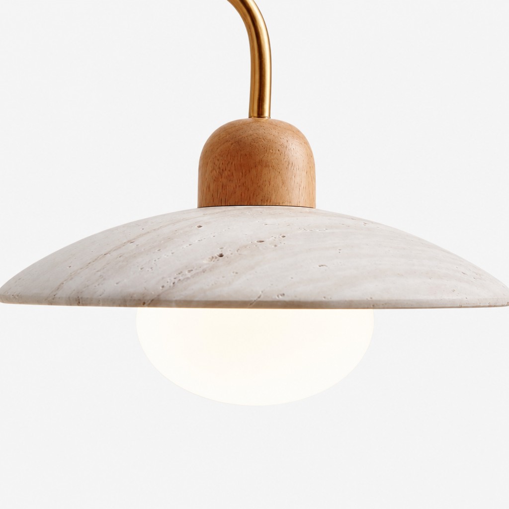 Discra travertine shade and glowing bulb detail