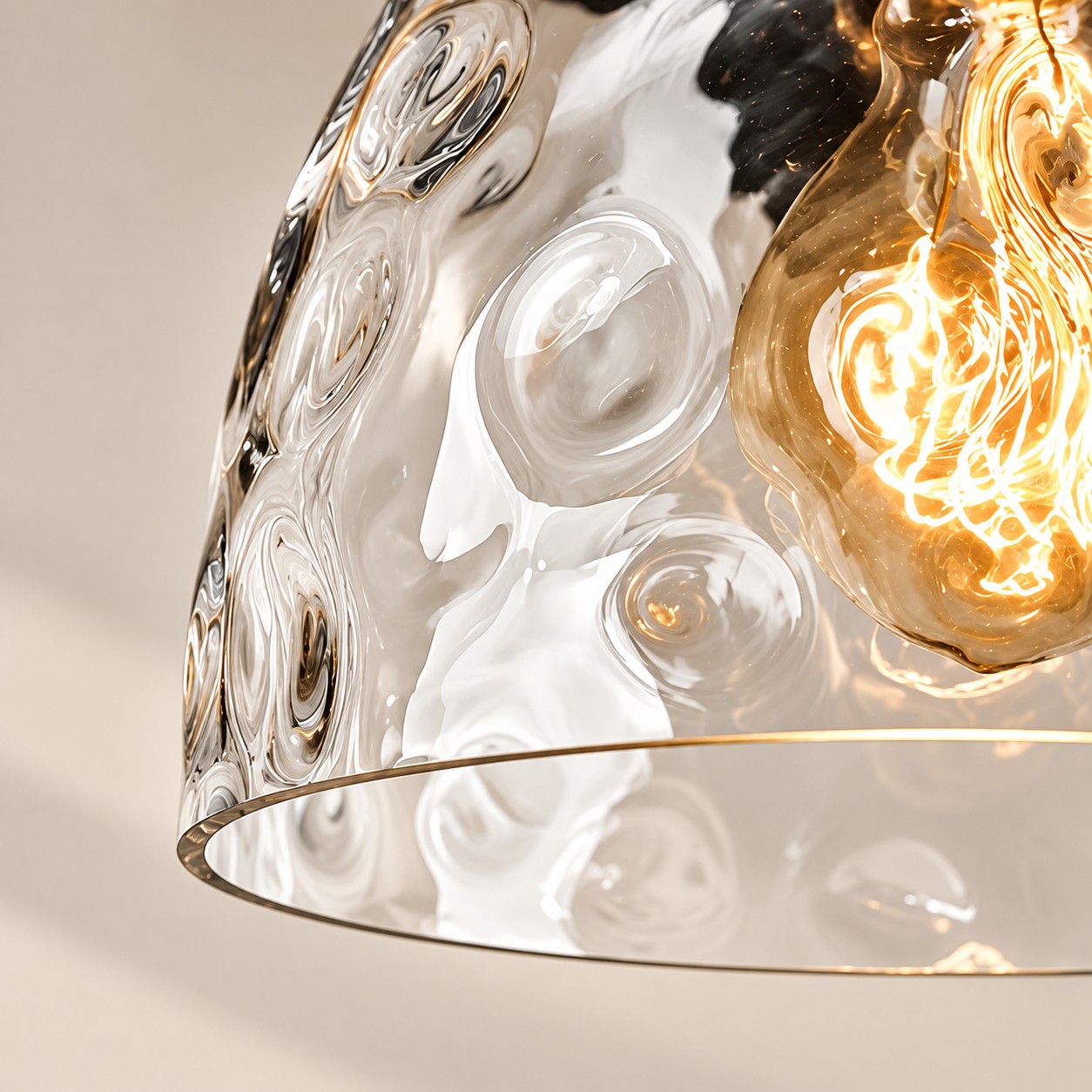 Textured Glass Wall Sconce with a clear shade and a visible bulb