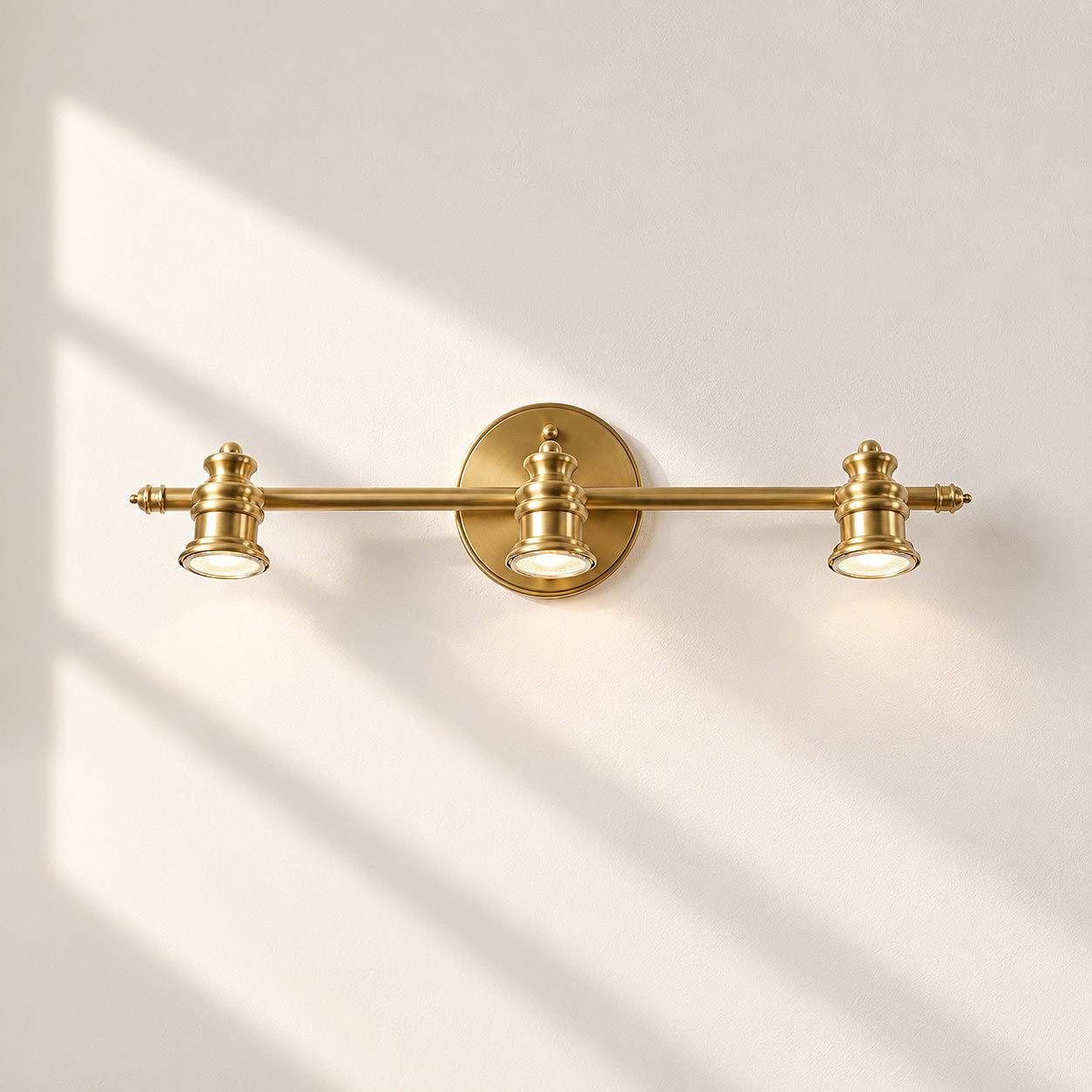Aurelia Brass Vanity Wall Light with one to five heads and a linear wall bar