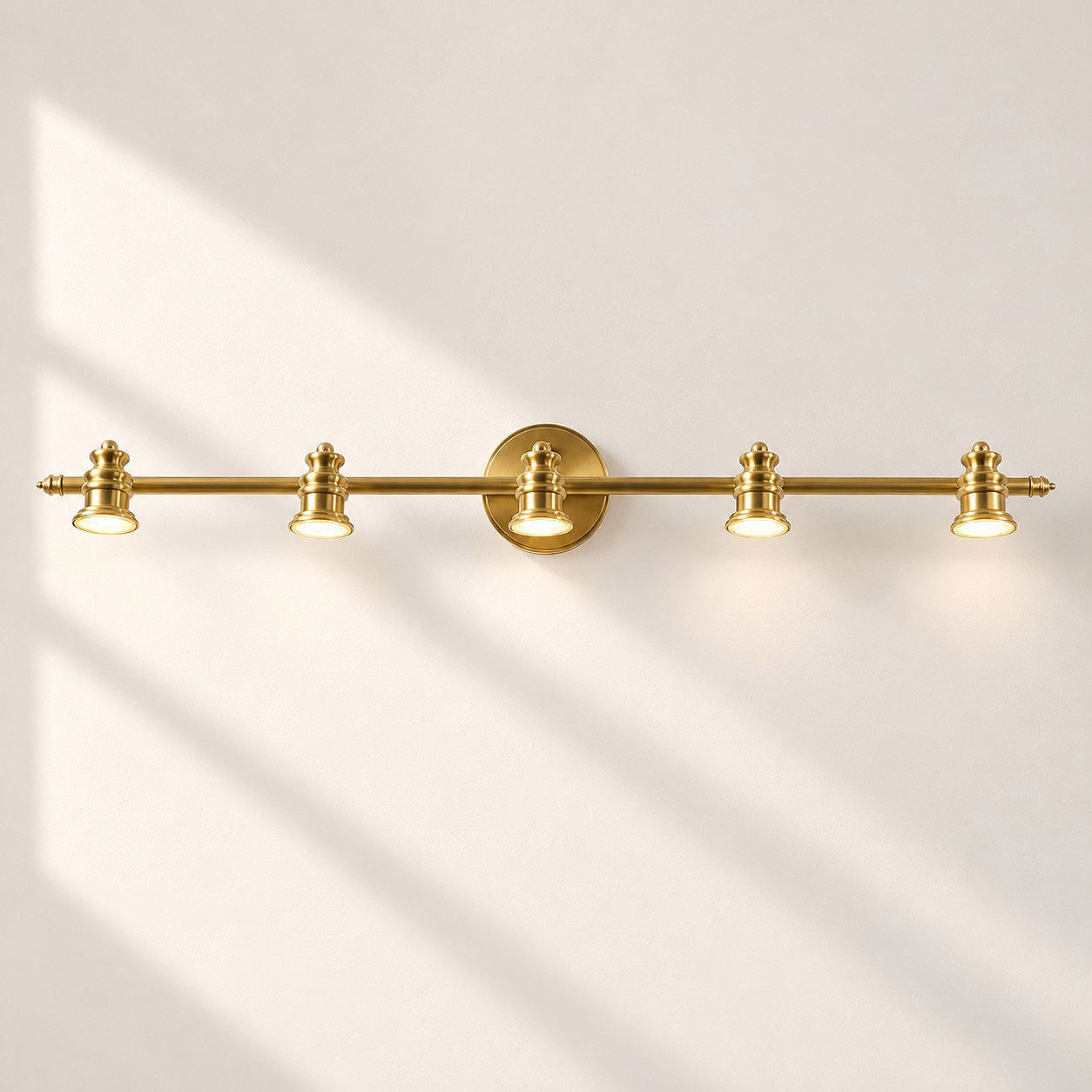 Aurelia Brass Vanity Wall Light with one to five heads and a linear wall bar