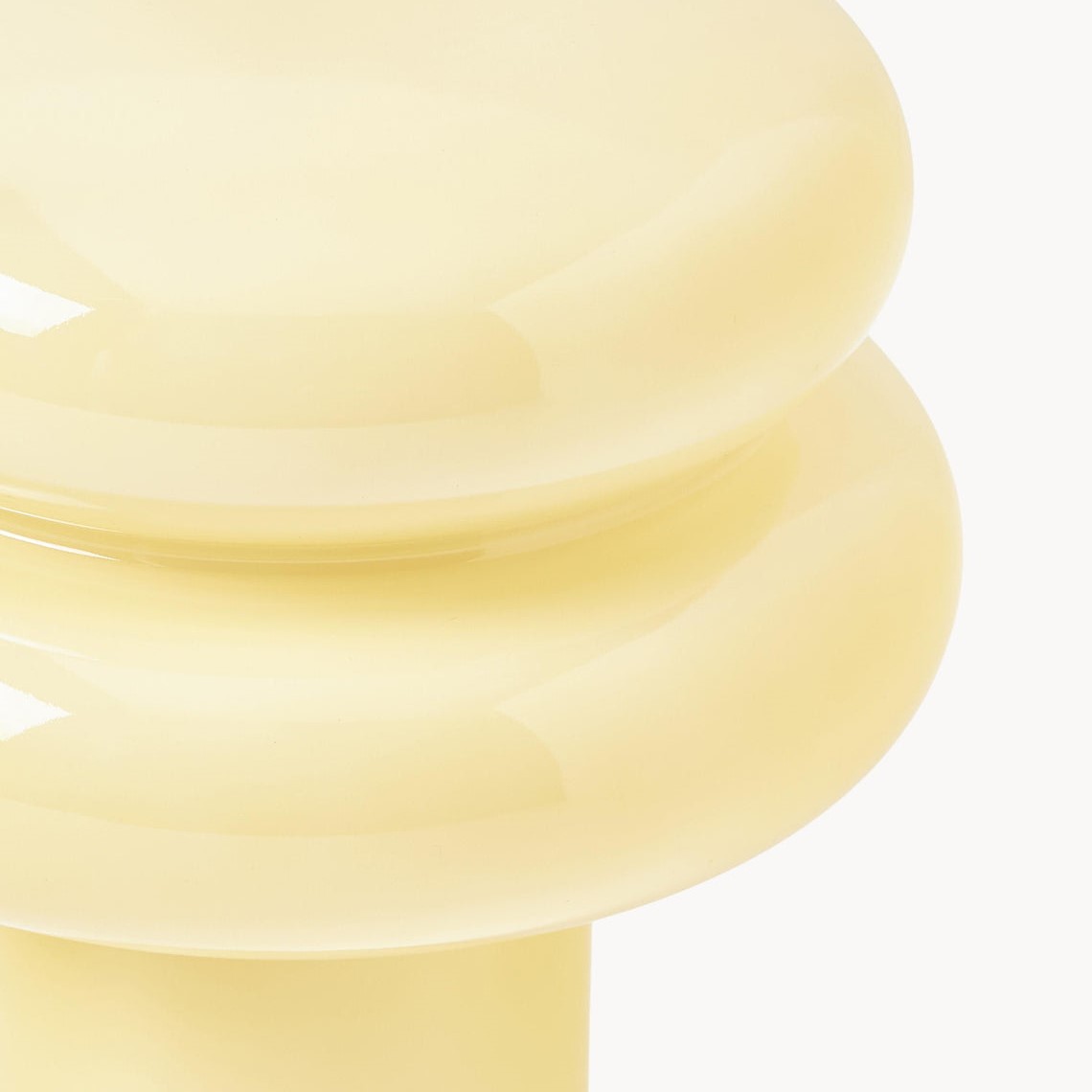 Close-up of illuminated opal glass shade