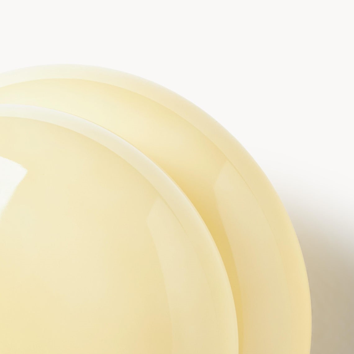 Lighted opal glass wall sconce detail