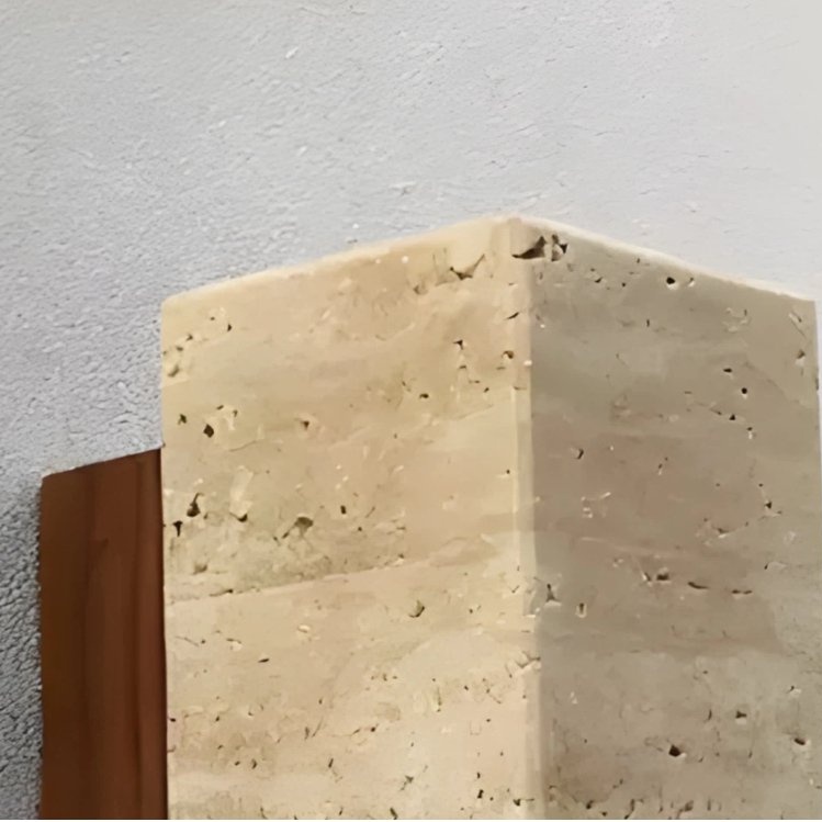 Close-up of Torvella travertine stone shade
