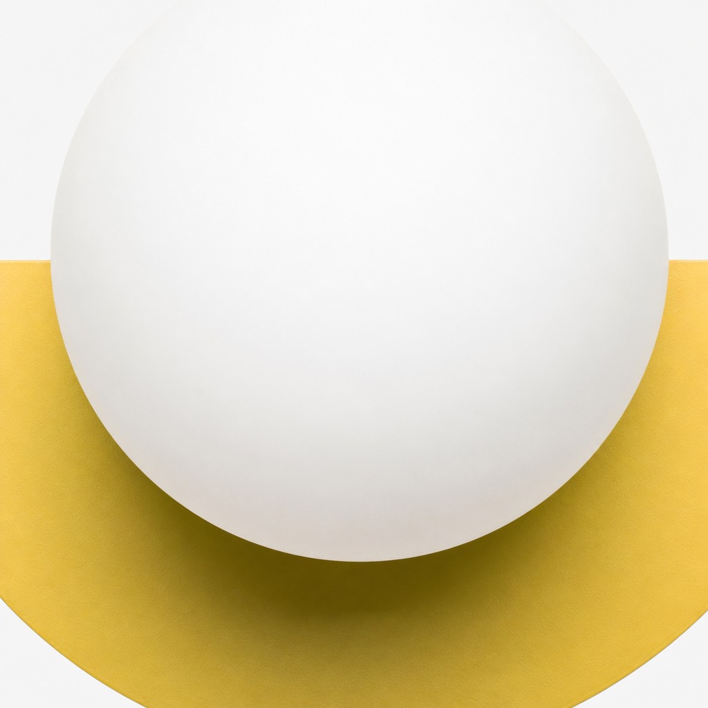 Front detail of the Orbion glass orb shade and metal body