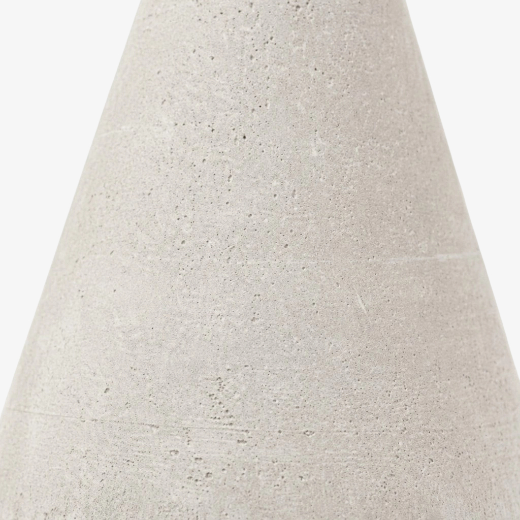 Concrete texture detail of the Concrellia wall sconce