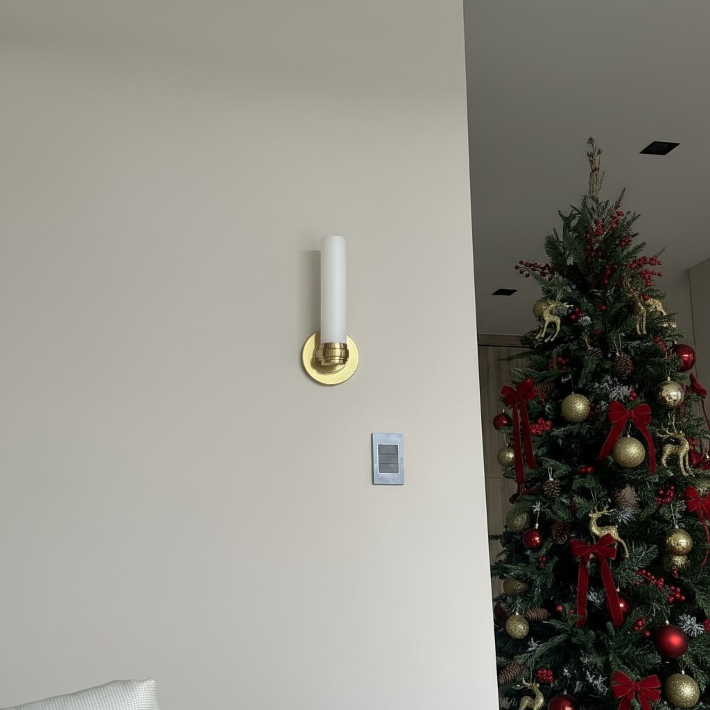 Customer photo of Roven wall sconce near a decorated tree