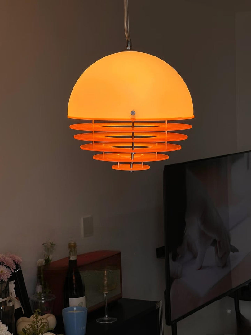 Close view of glowing orange layered pendant light