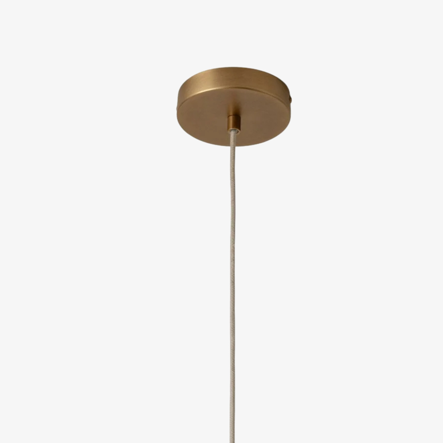 Aged brass ceiling canopy and pendant cable detail