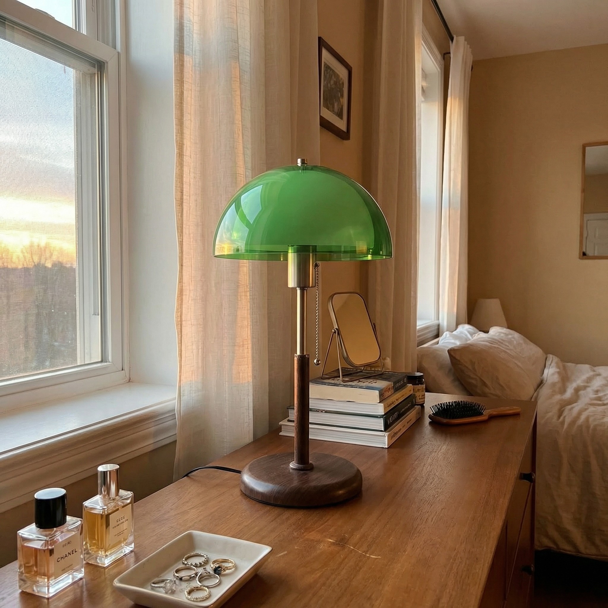 Green Afterglow table lamp on a bedroom dresser