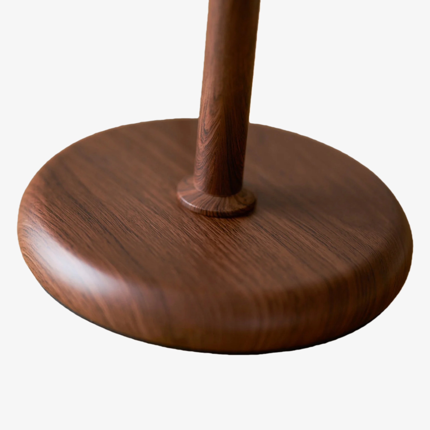 Rounded wood base detail of the Afterglow table lamp