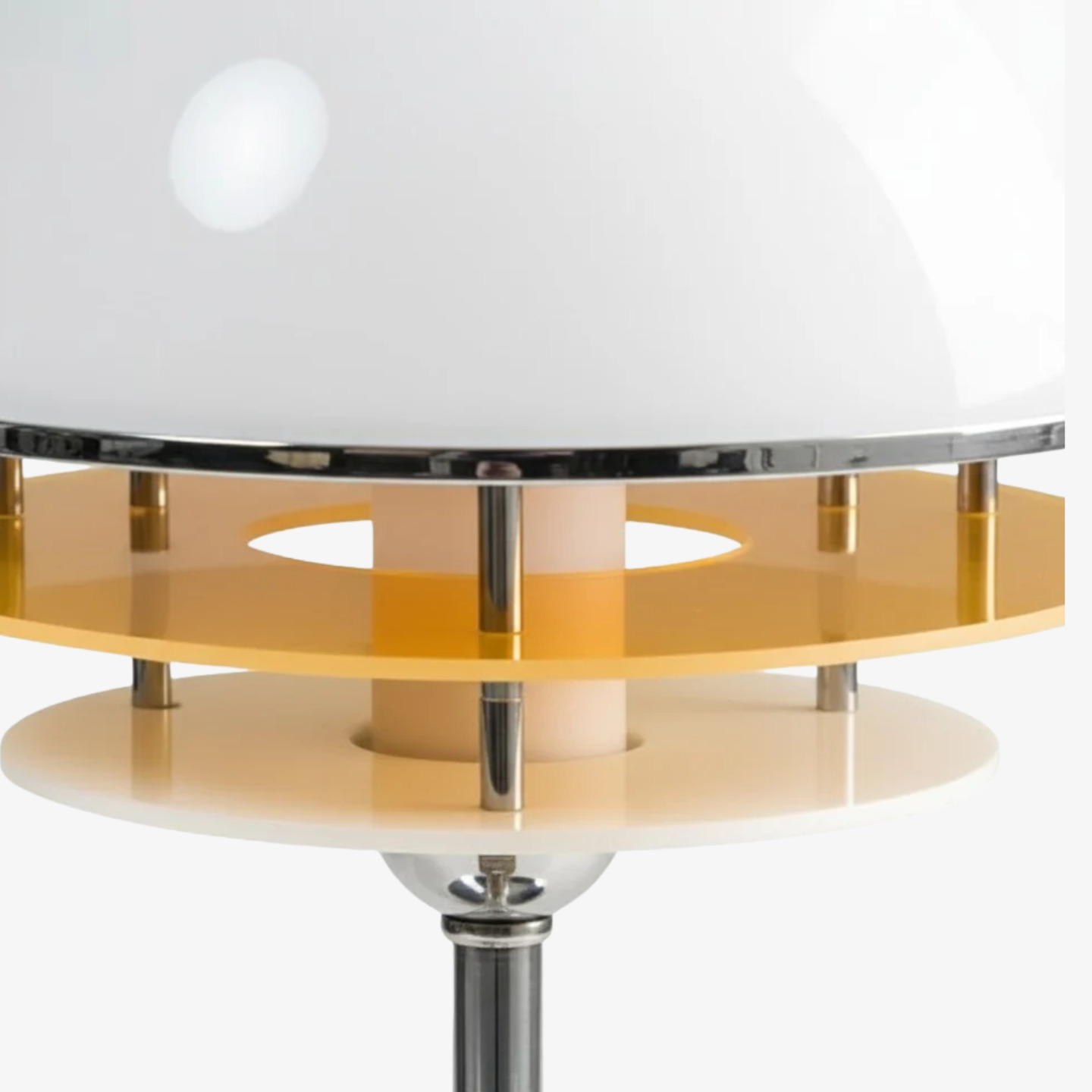 Close detail of white and orange layered lamp shade