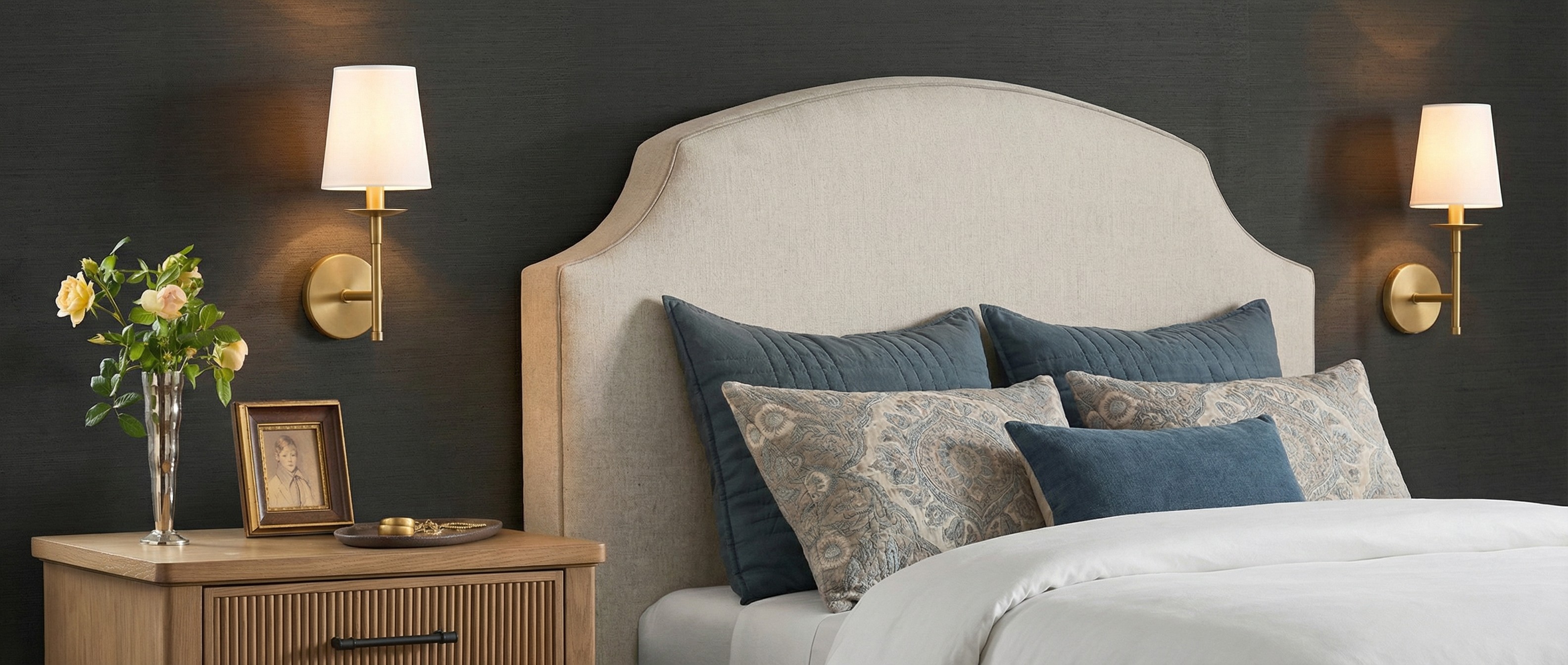 Rowan wall sconces beside a fireplace in a living room