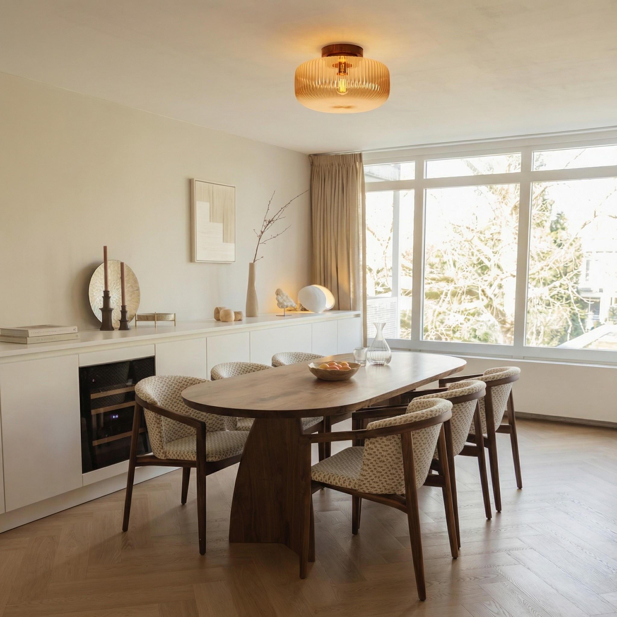 Navello ceiling light above a dining room