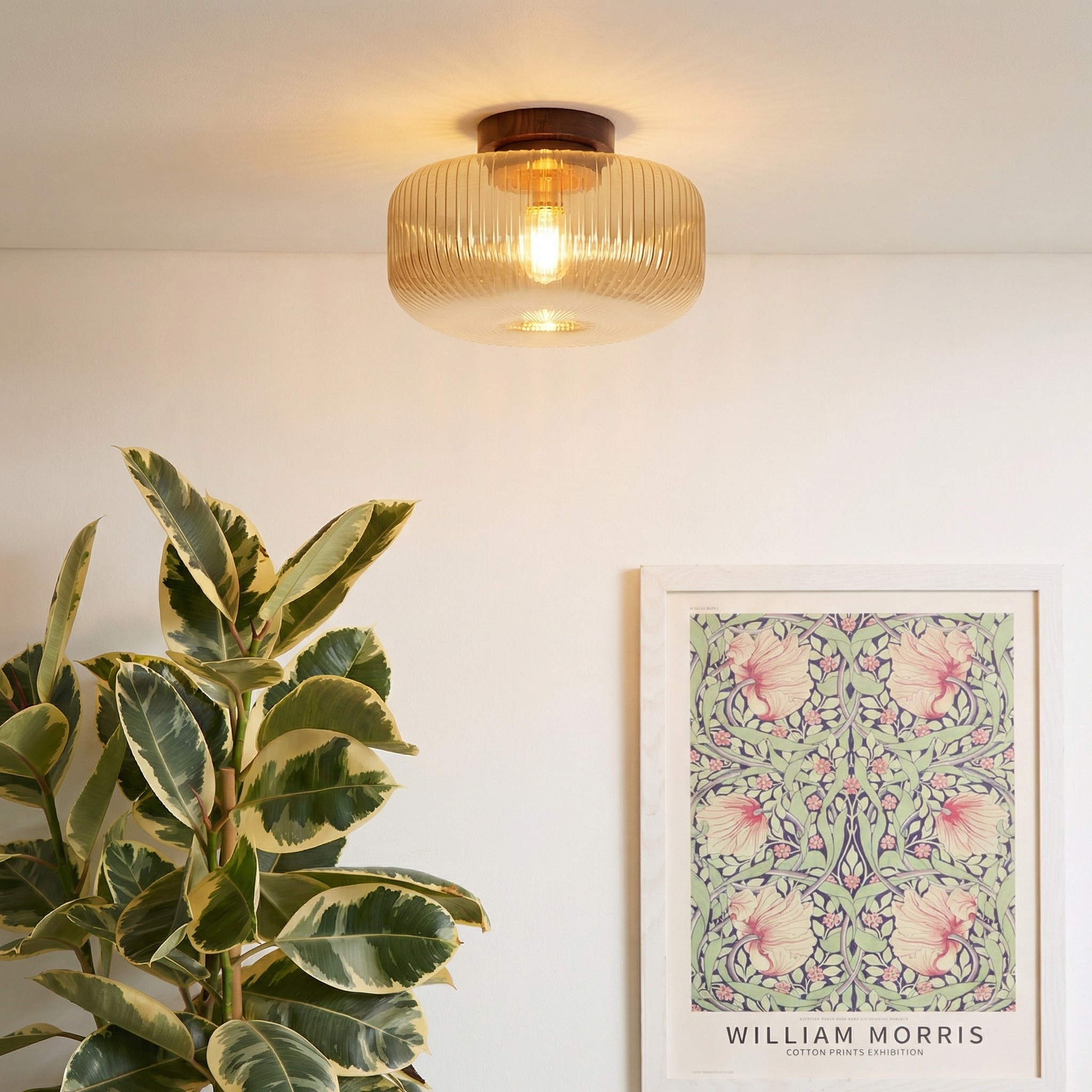Navello amber ribbed glass ceiling light styled in a customer room
