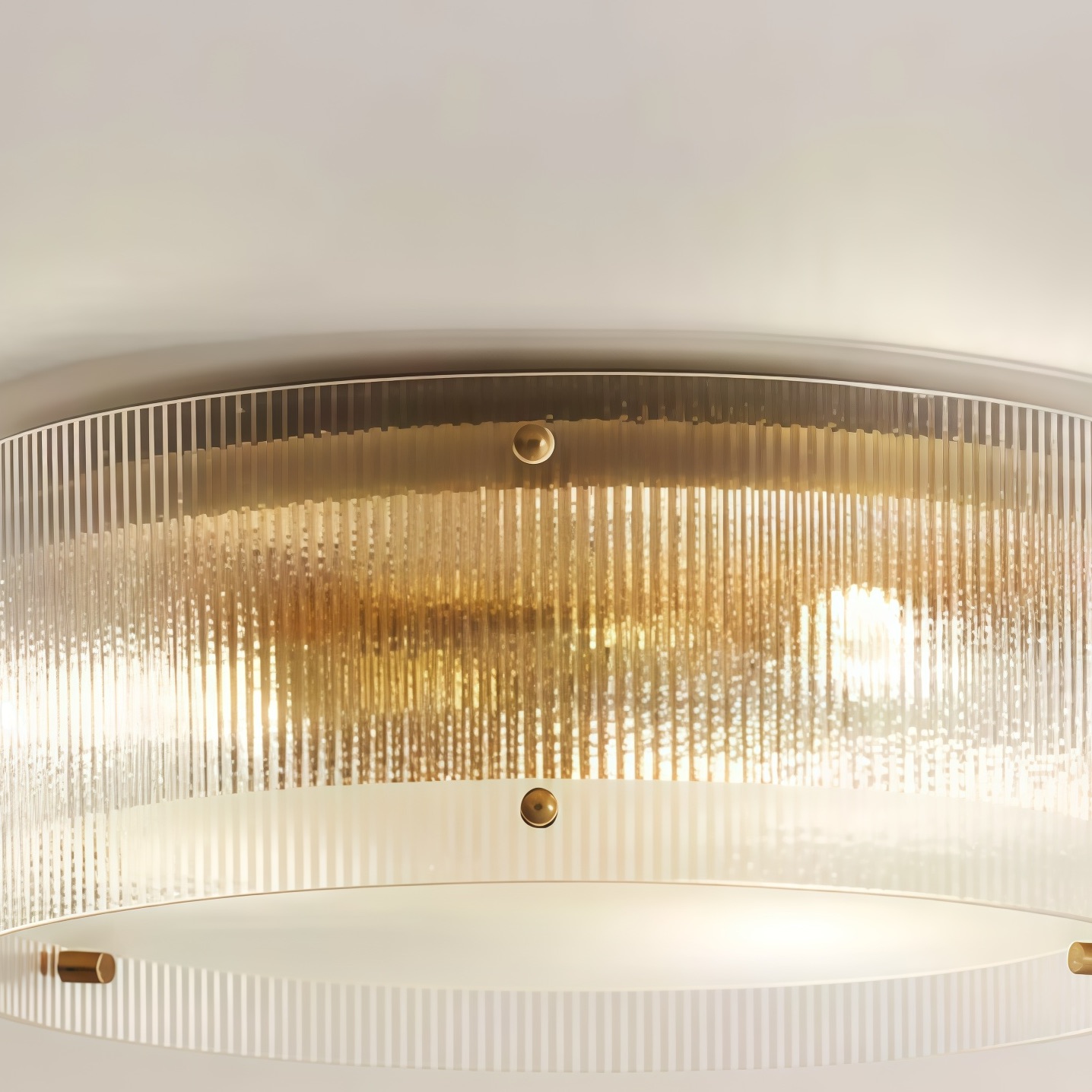 Detail view of the Ribella fluted glass shade and brass trim