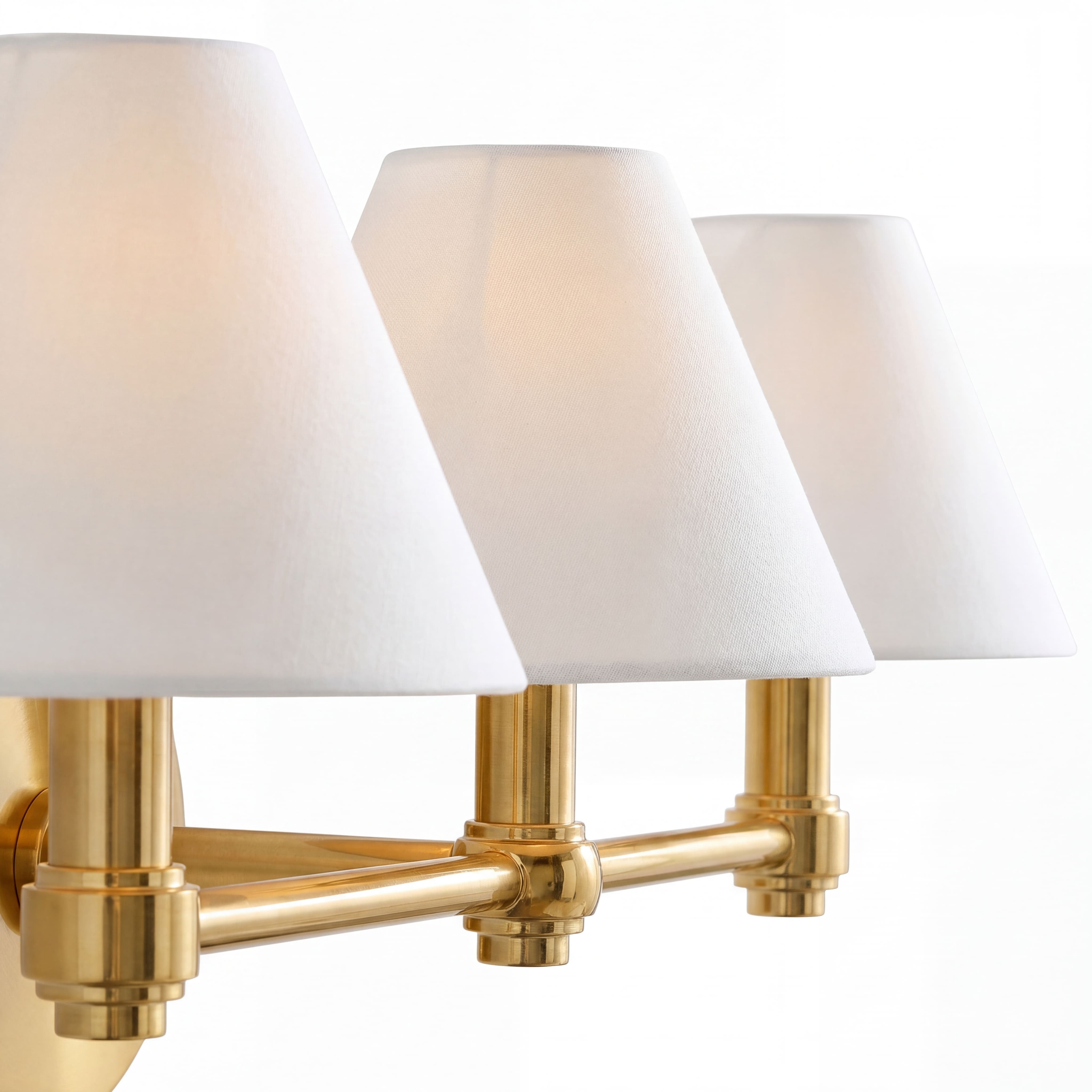 Aged brass triple Roven vanity light detail