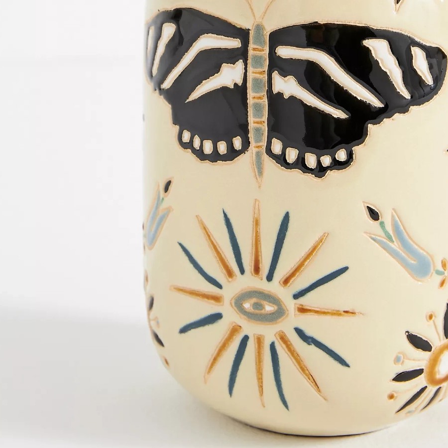Close view of handcrafted ceramic wax resist motif
