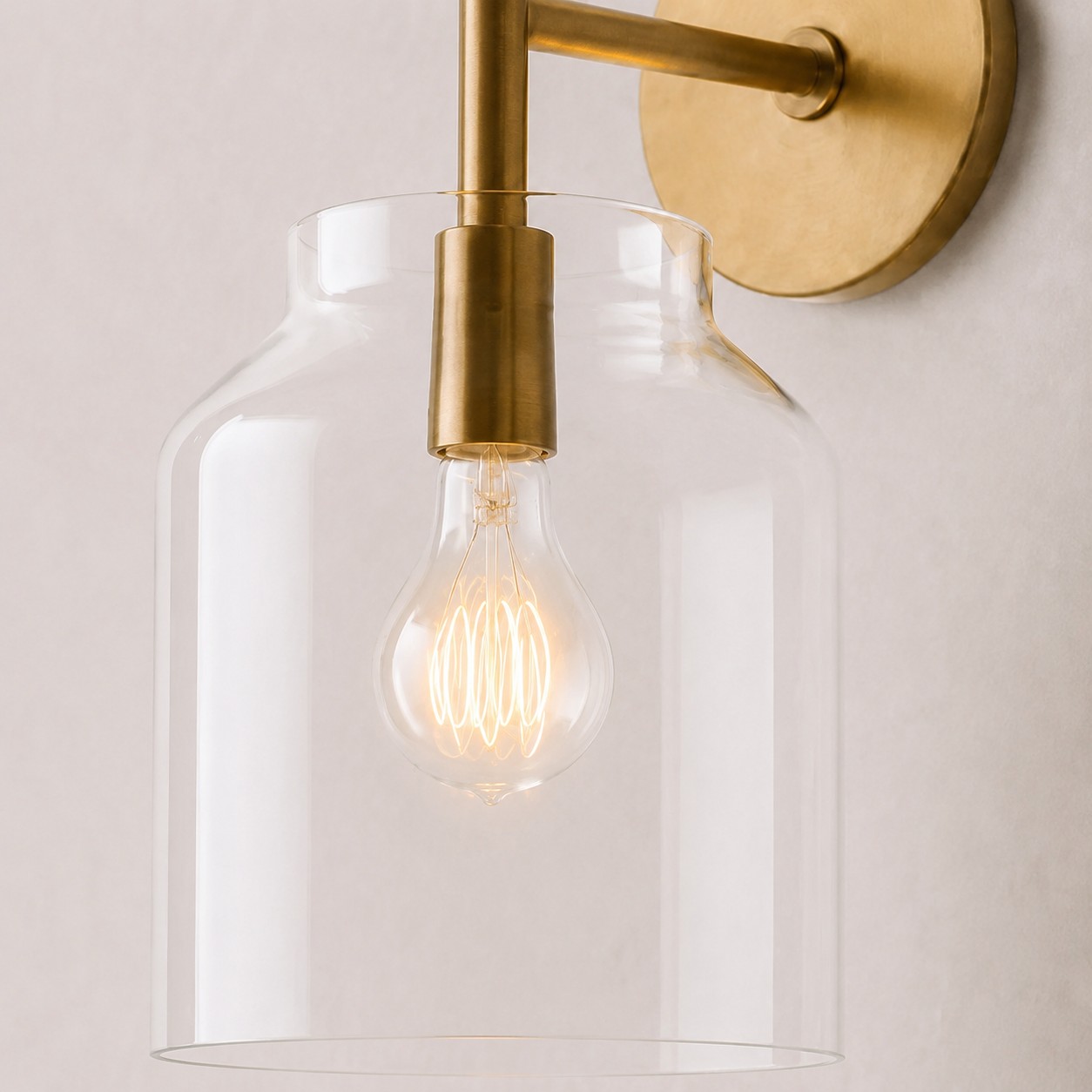 Hanton sconce clear glass shade and bulb detail