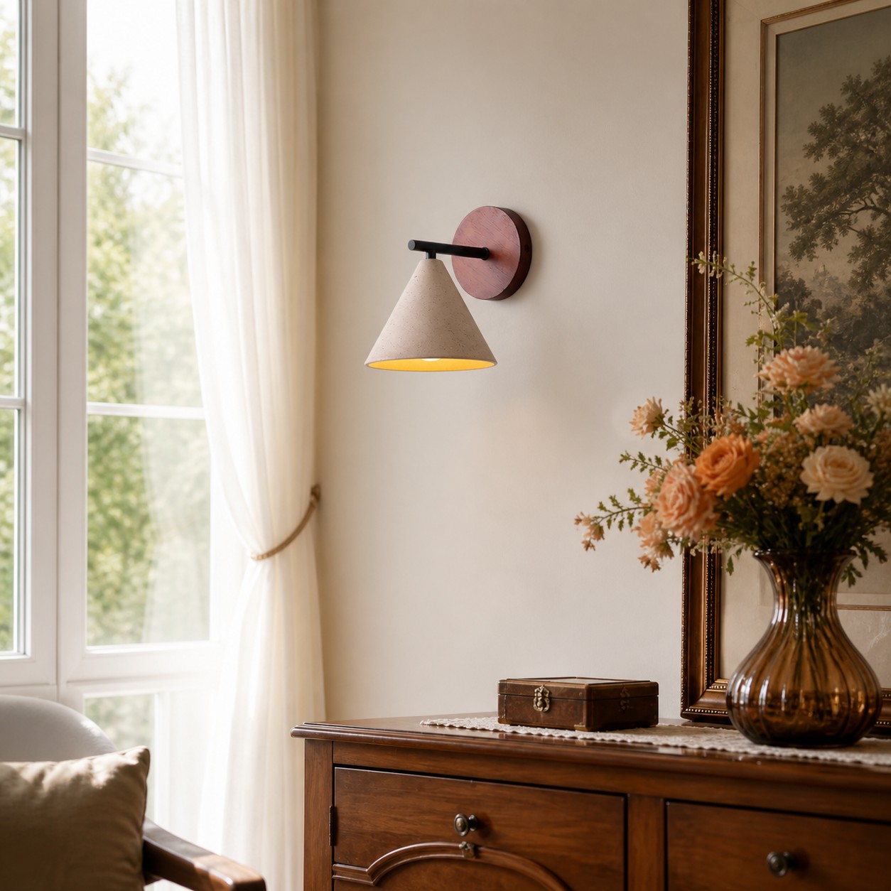Travira wall light styled above a cabinet in a bright room