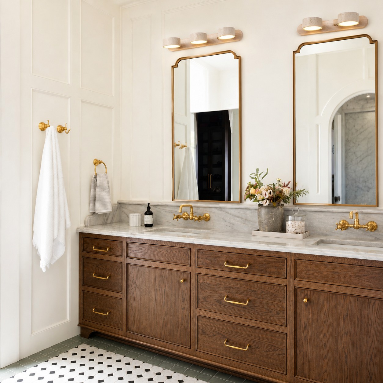 Travira linear sconces above bathroom mirrors