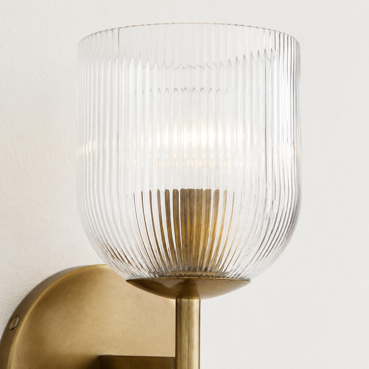 Clear glass shade and filament bulb detail