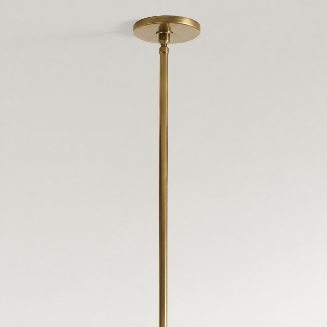 Brushed gold sphere hub and chain detail