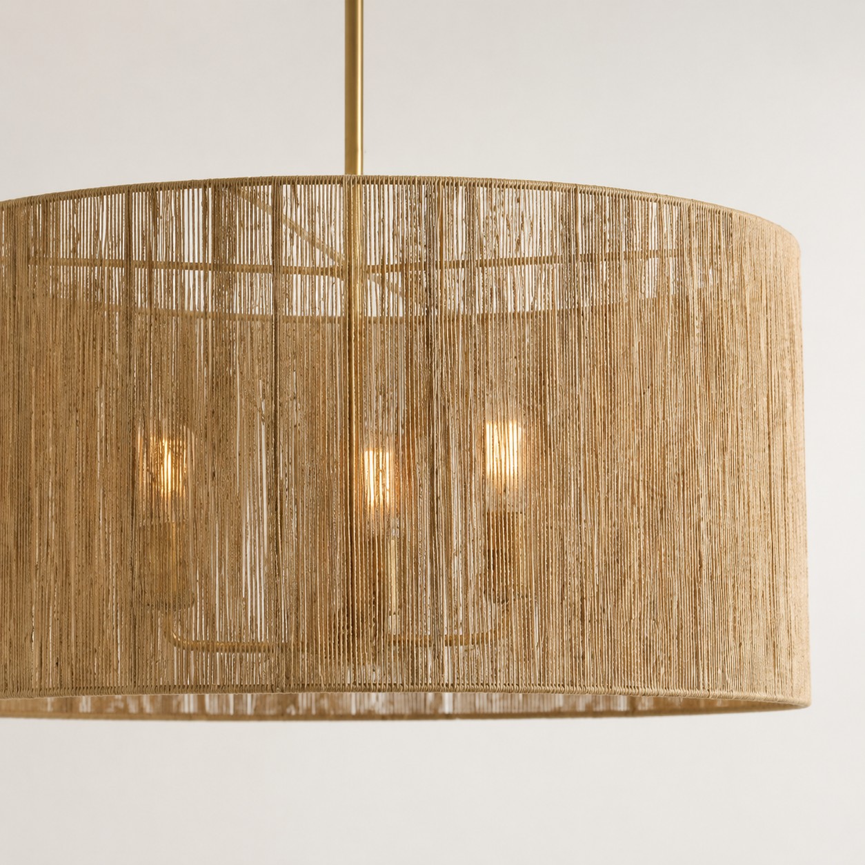 Brushed gold frame and clear glass pendant detail