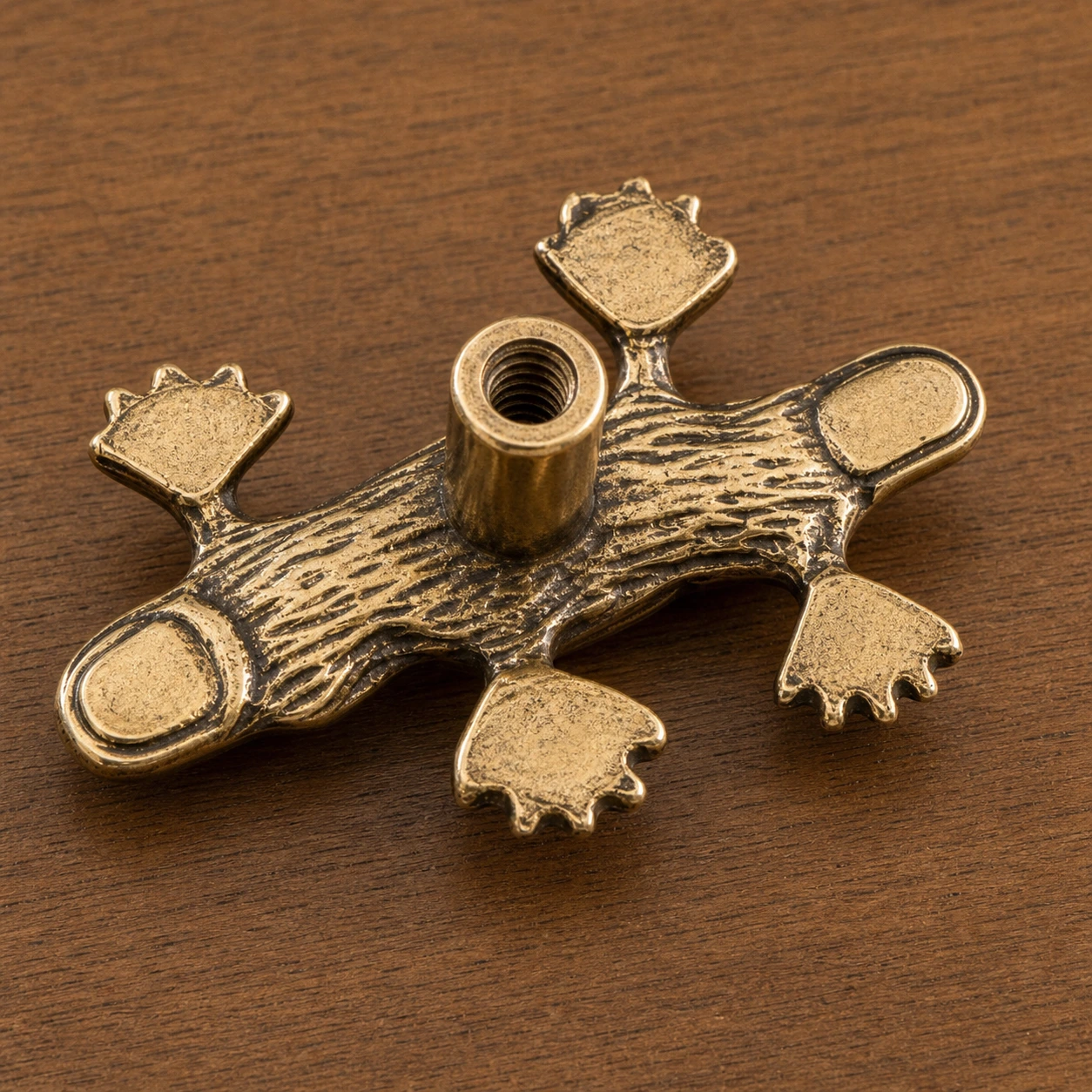 Backside detail of hollow threaded mounting post on Totem cabinet handle