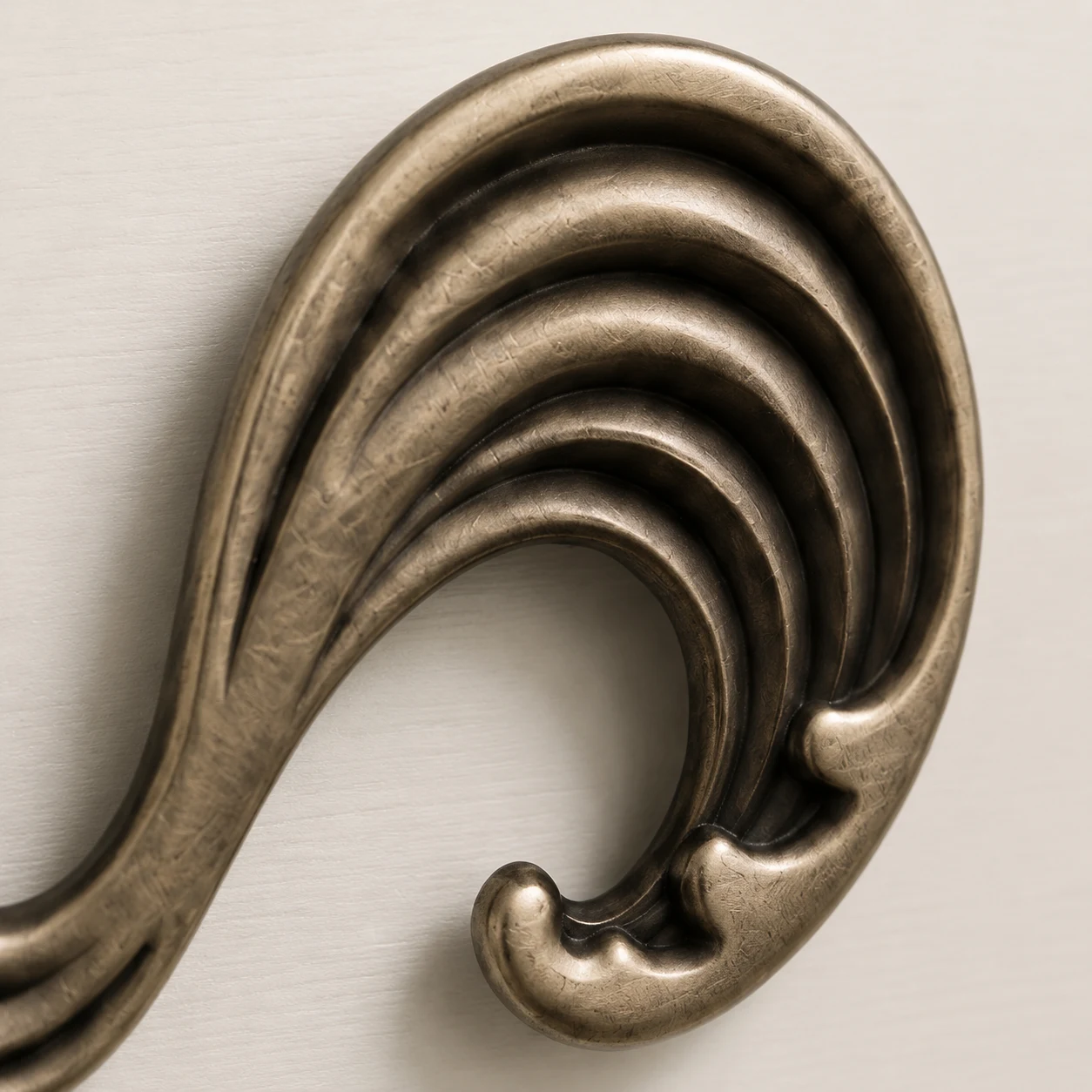 Antique brass Wave cabinet knob macro texture detail