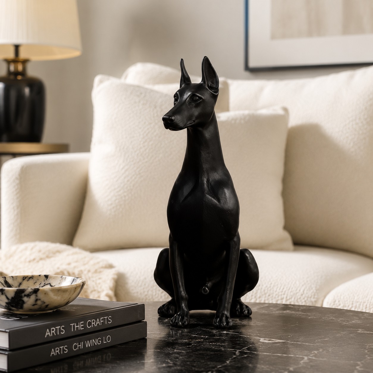 Black Doberman ornament on a living room coffee table