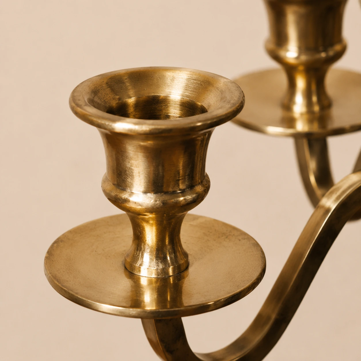 Close detail of Aura copper candle cup and polished finish