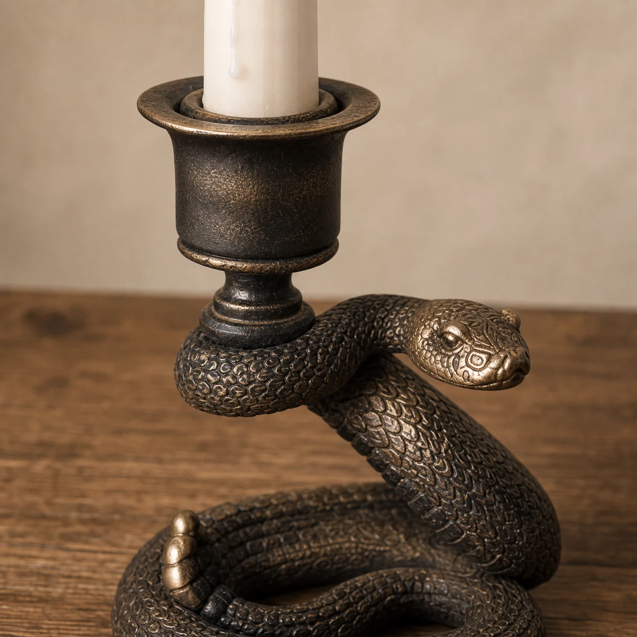 Close-up of the candle cup and raised snake body connection