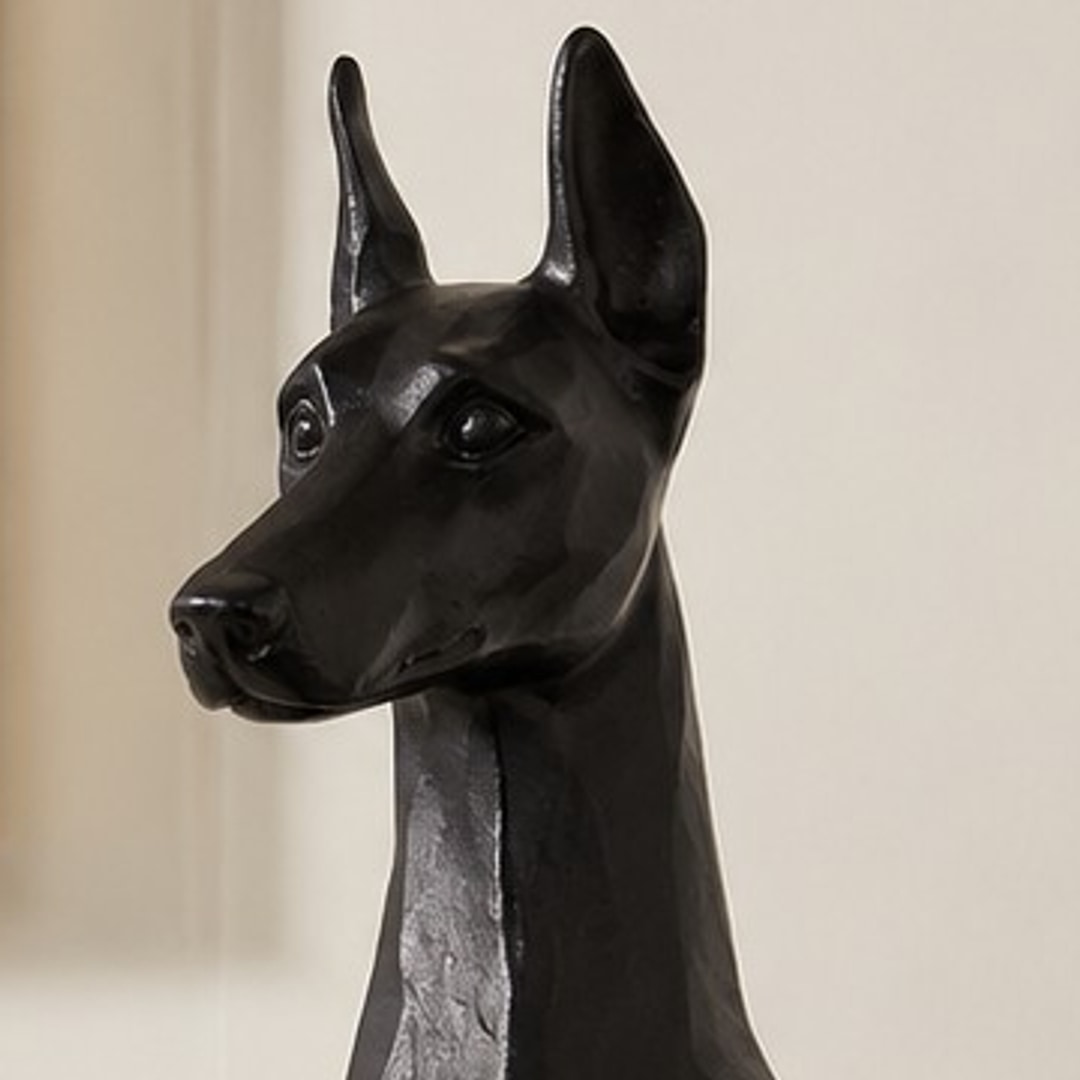 Close-up of the Doberman ornament head, ears, and eyes