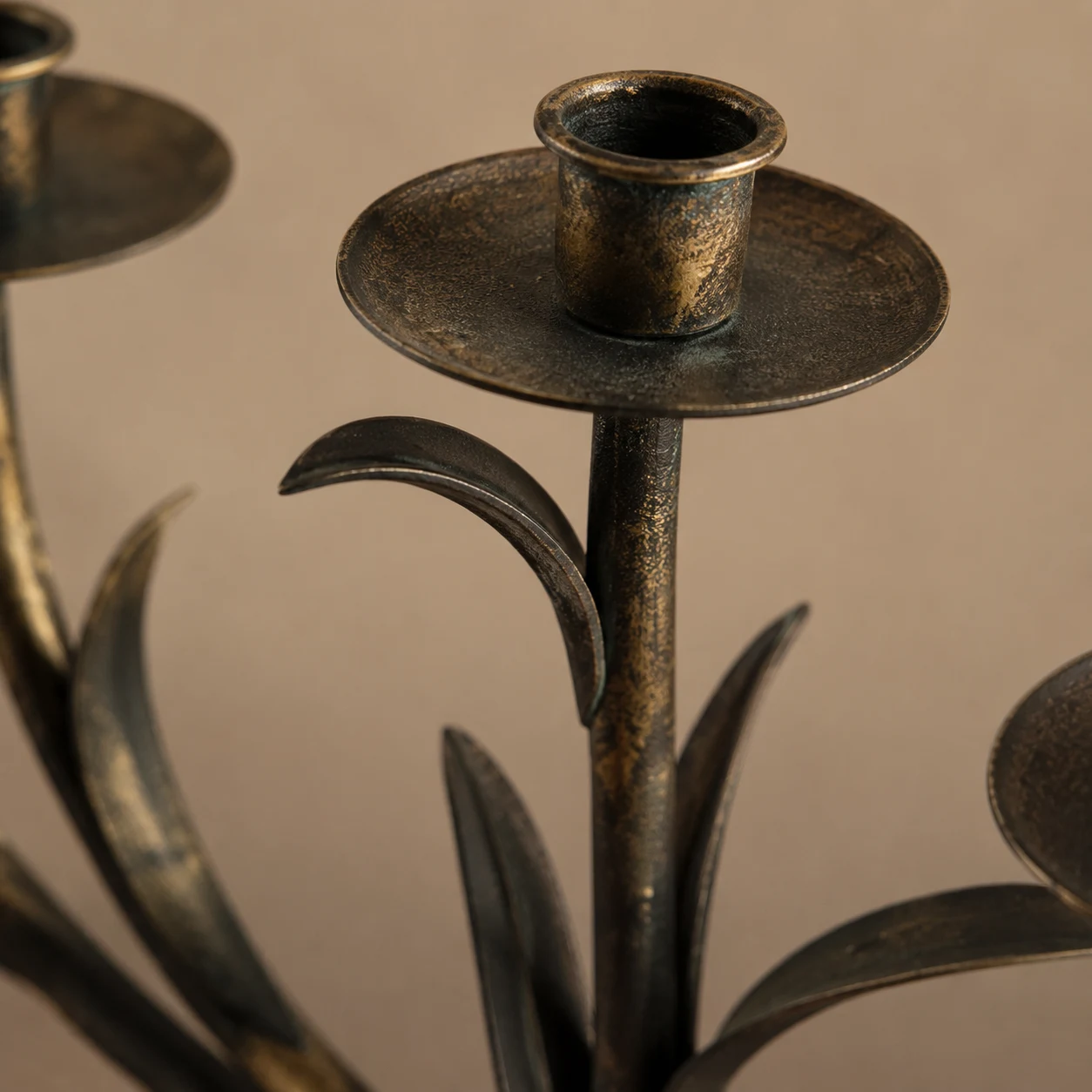 Antique copper surface texture detail on Aura candlestick