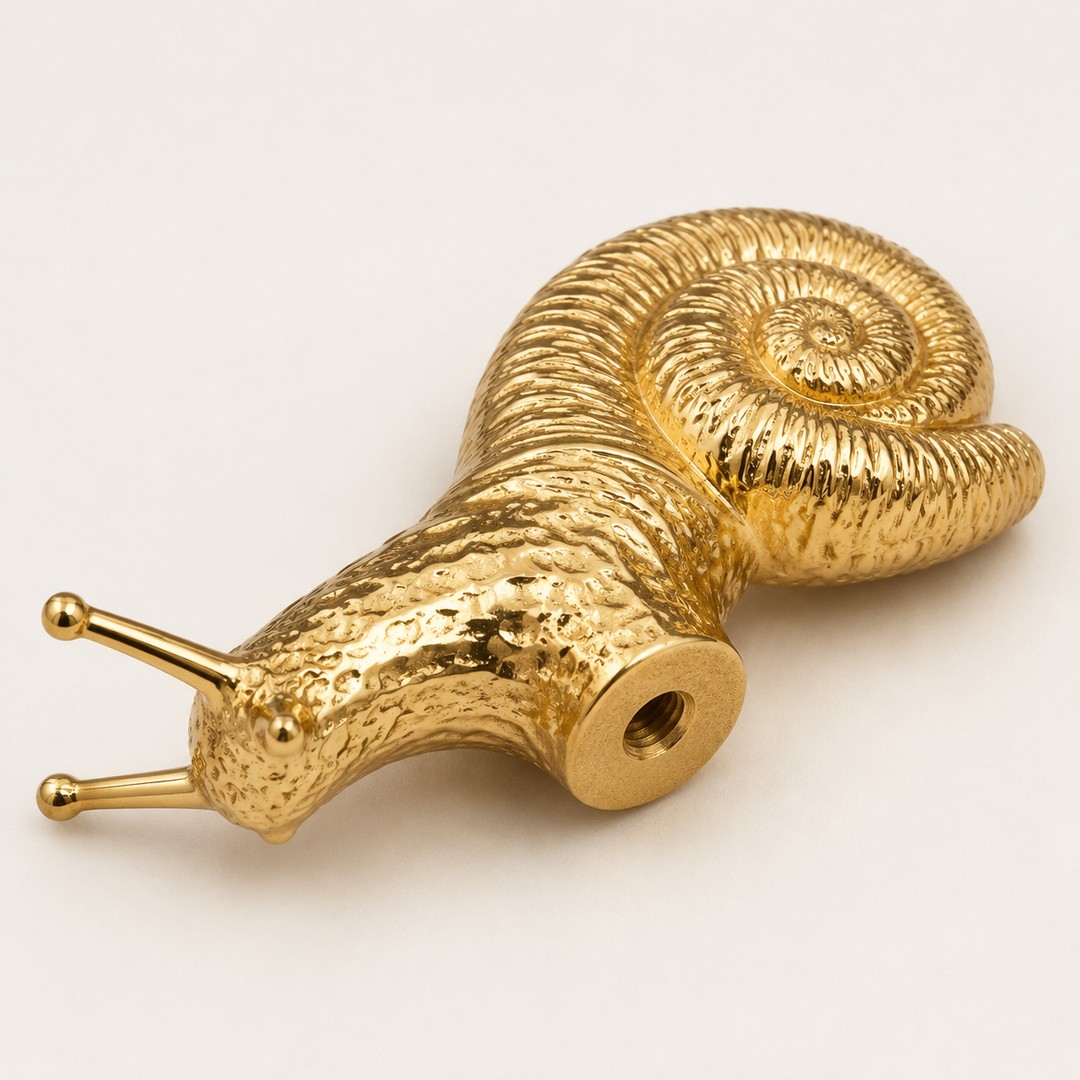 Back and mounting detail of the brass snail cabinet knob