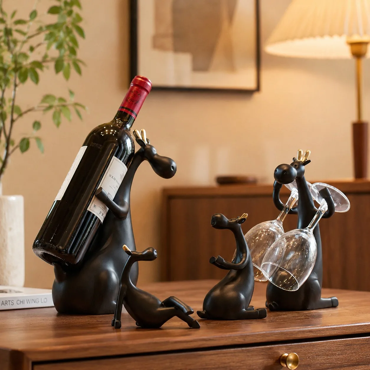 Forma A+B+C+D wine holder set styled on a tabletop