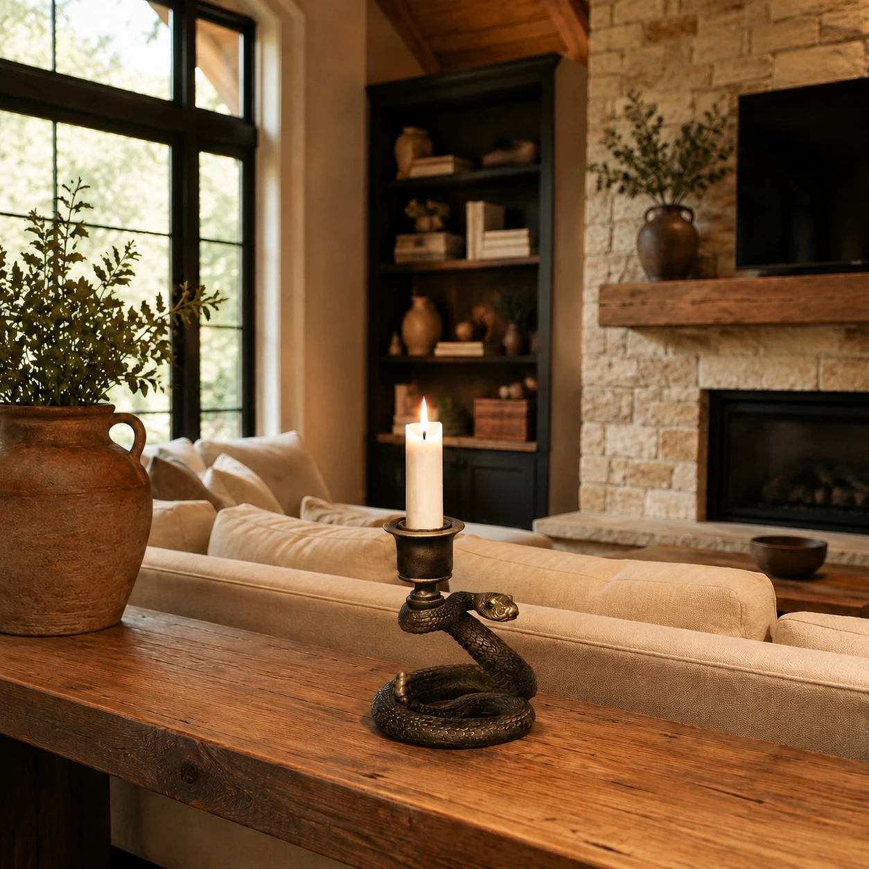Aura Snake Candlestick on a living room console table