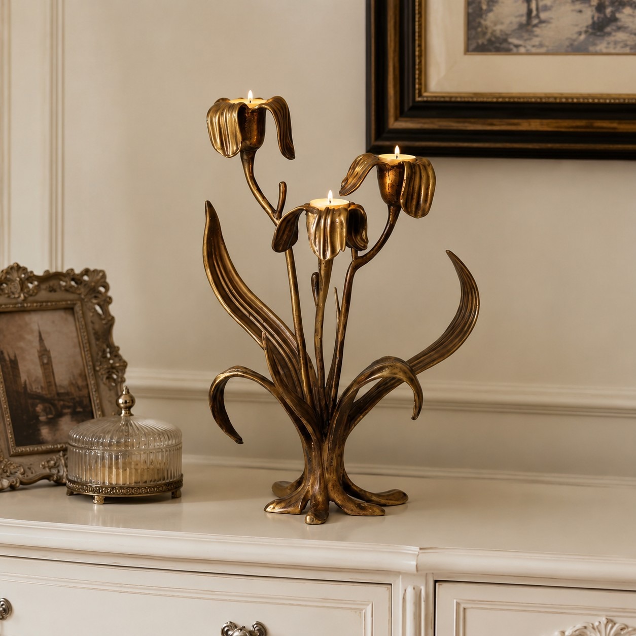 Aura Iris antique copper candle holder styled on a cabinet