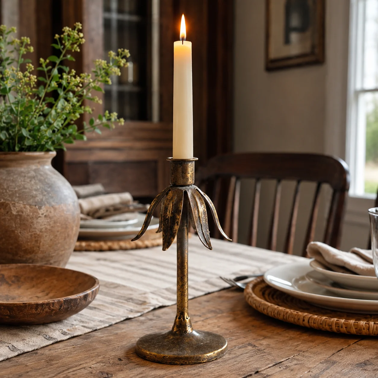 Short Aura candlestick in a warm tabletop setting