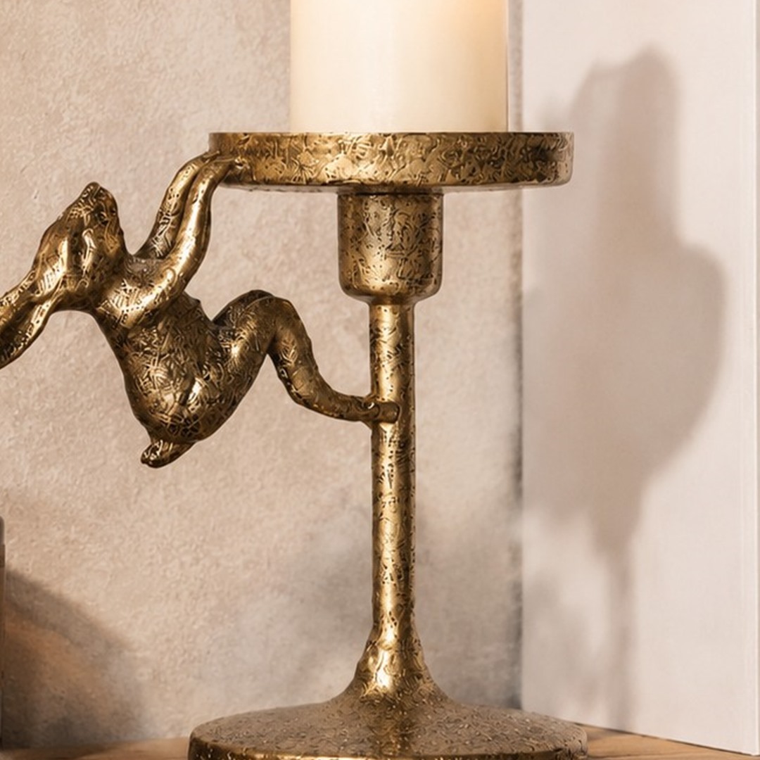 Close view of the candle tray and stem connection on the tall Aura candlestick