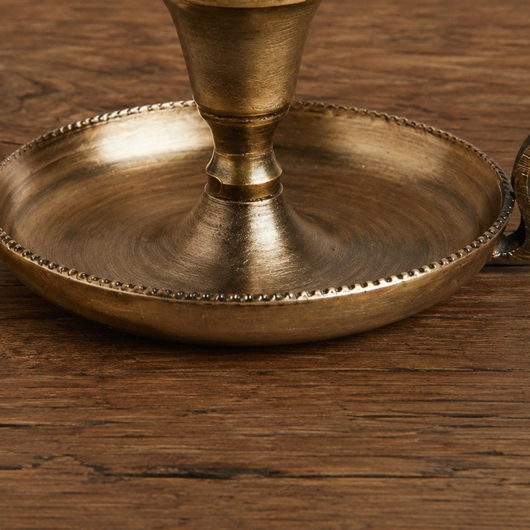Close-up of Aura candlestick tray and stem