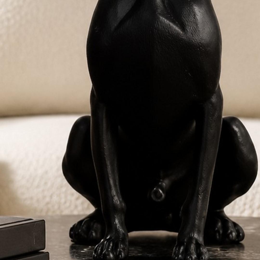 Close-up of the Doberman ornament front legs, paws, and base contact