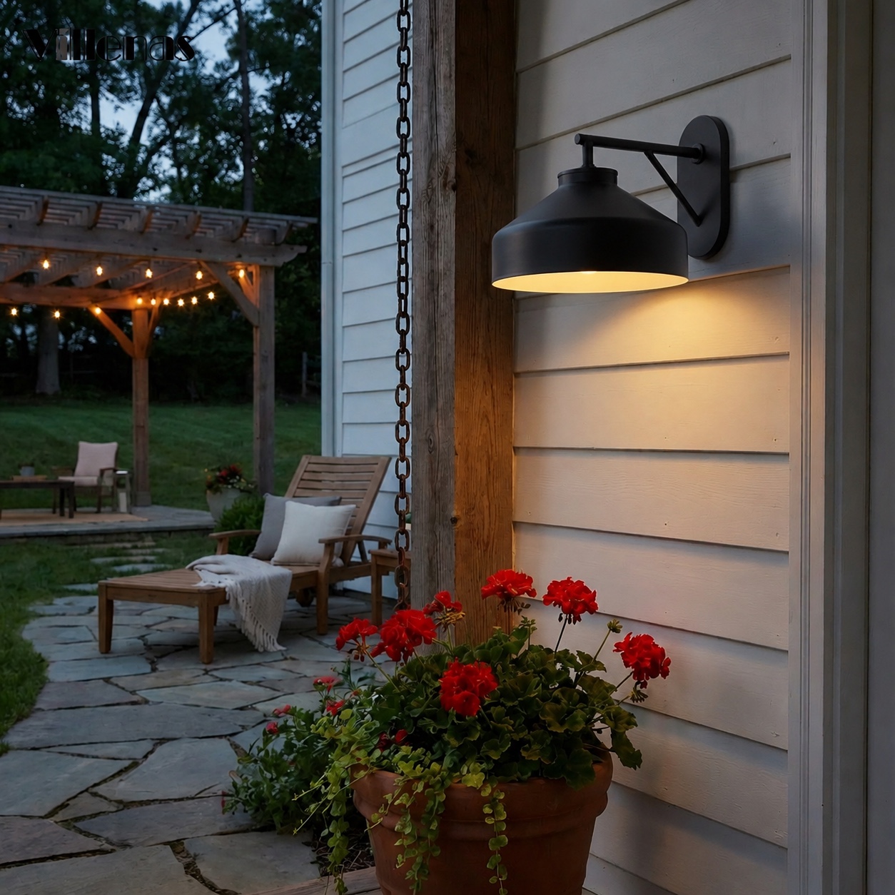 Hanton wall light illuminating an outdoor seating area