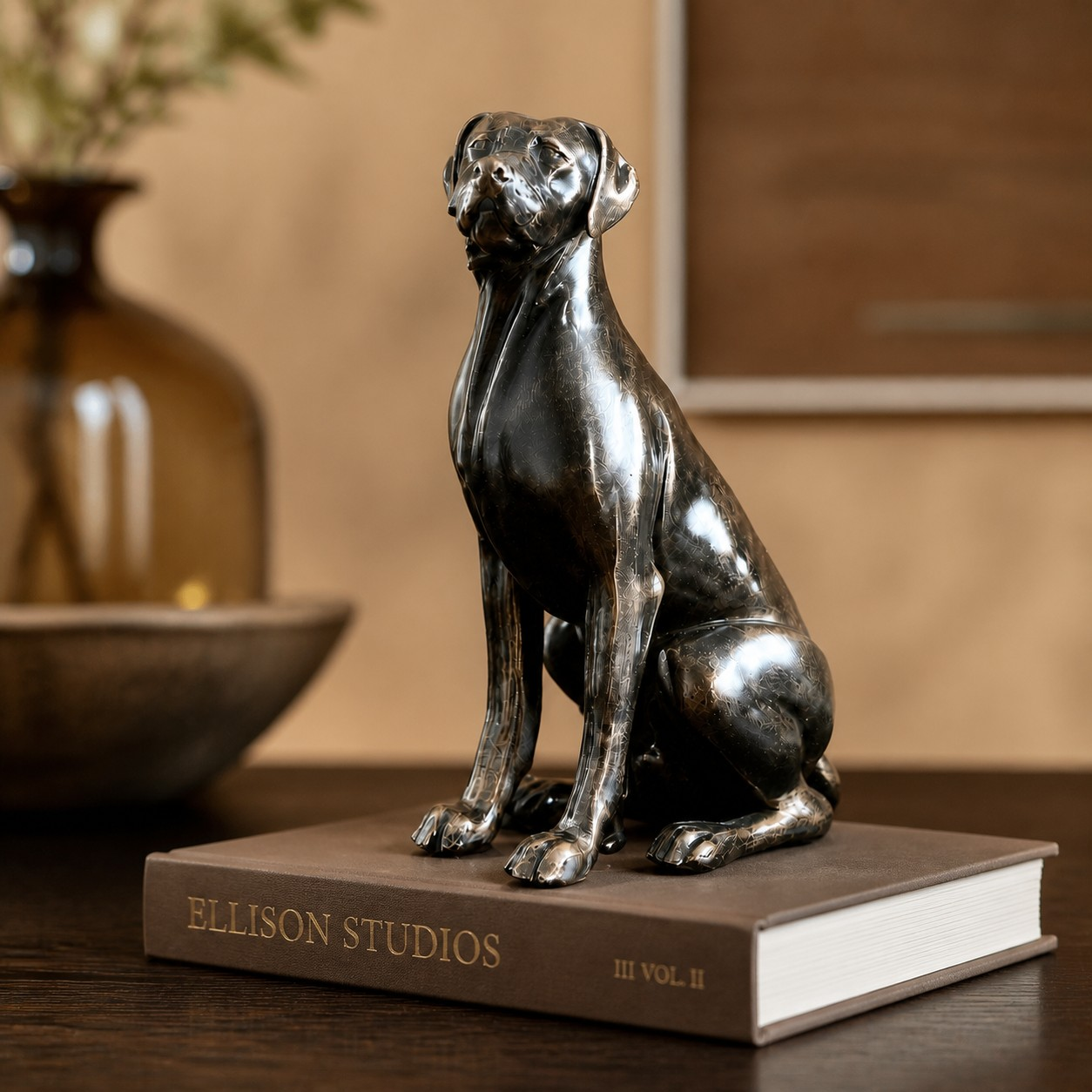 Sitting Floxo sculpture on books
