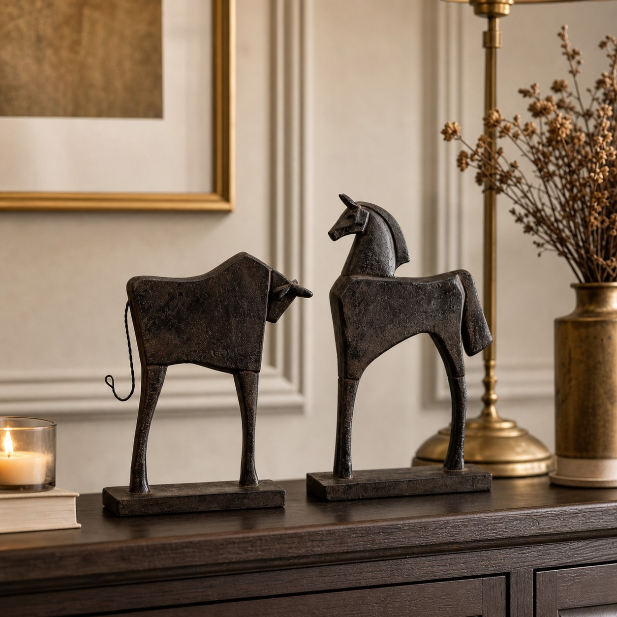 Equora horse and bull sculptures on a warmly styled console