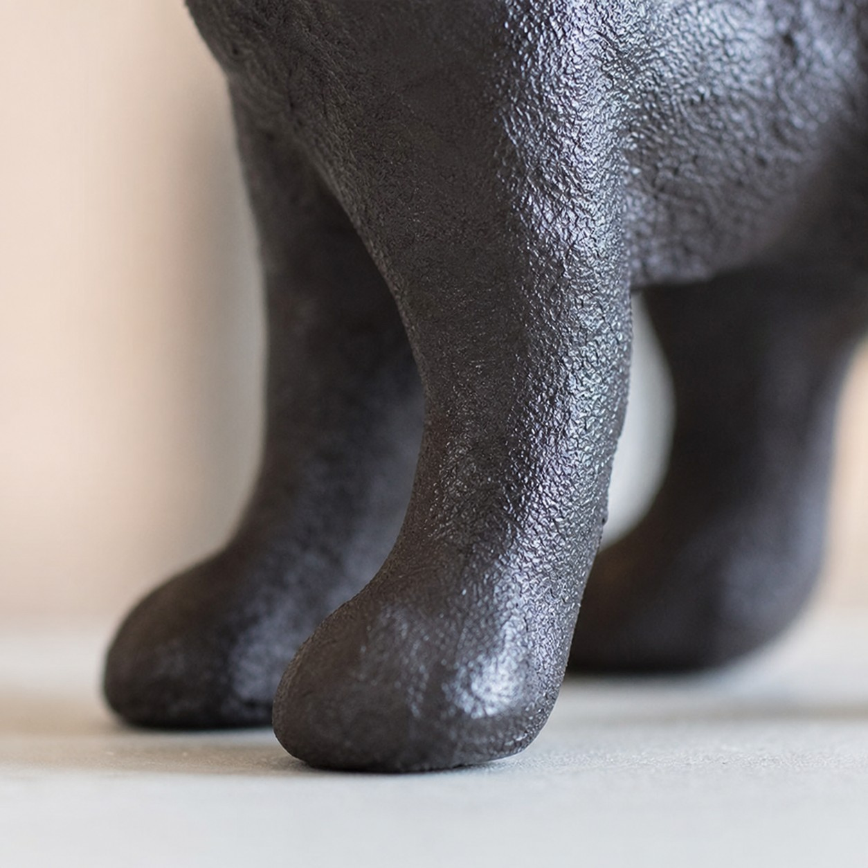 Cast iron Schnauzer figurine leg detail