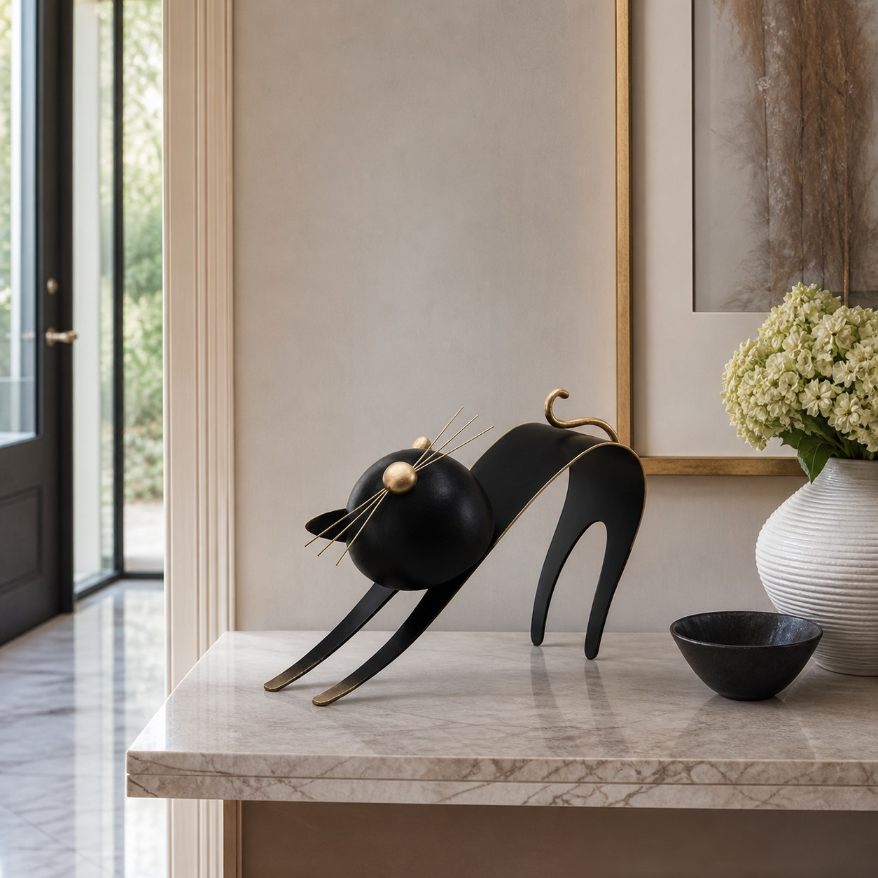 Felora sculptural metal cat figurine in a bright interior