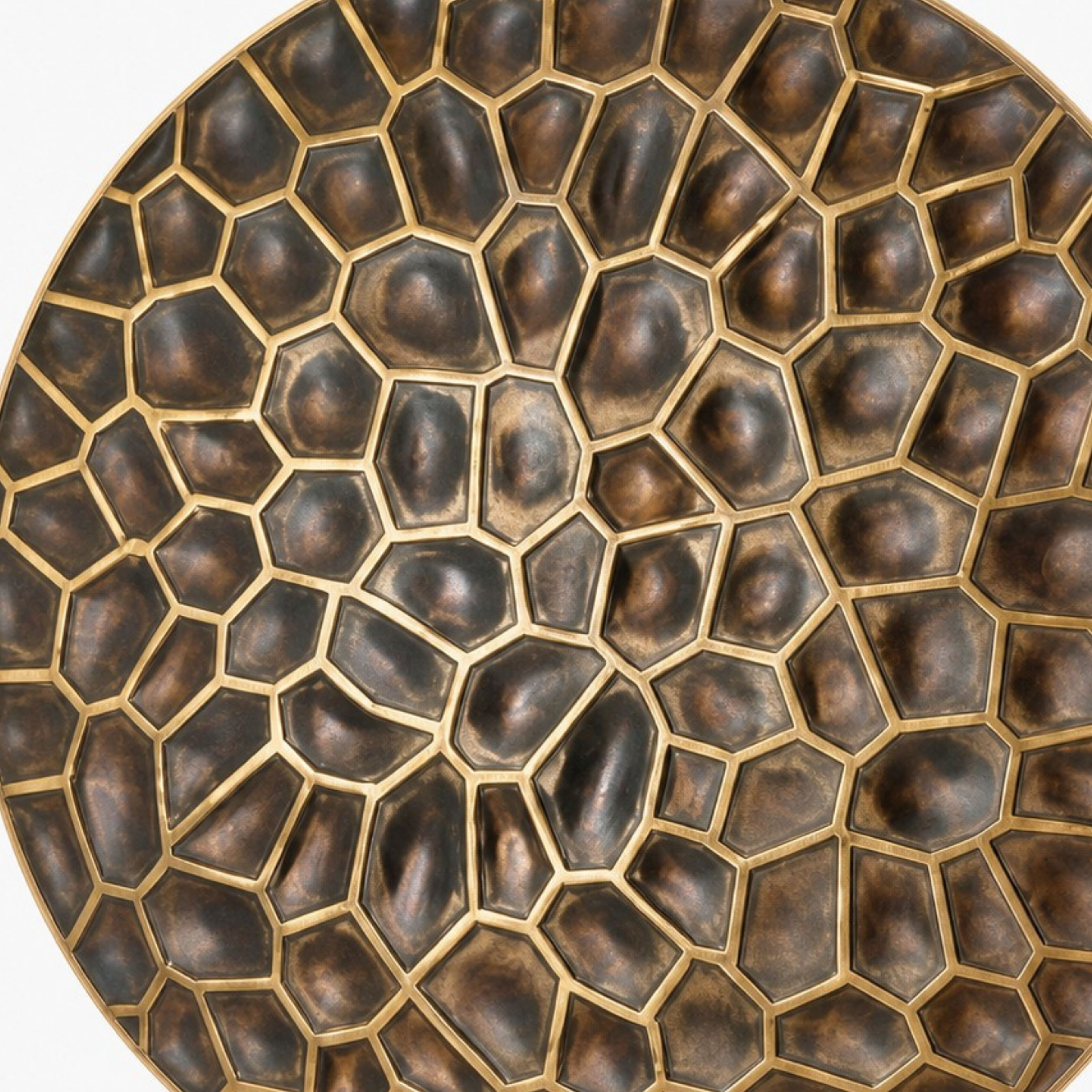 Sculpted dark bronze mosaic texture with brass outlines