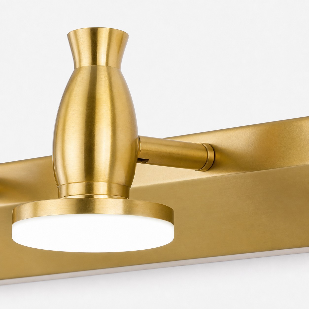 Brushed brass finish close-up on the lamp head