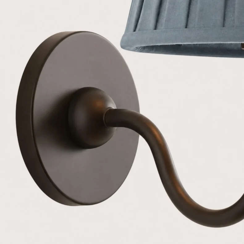 Curved bronze arm and canopy